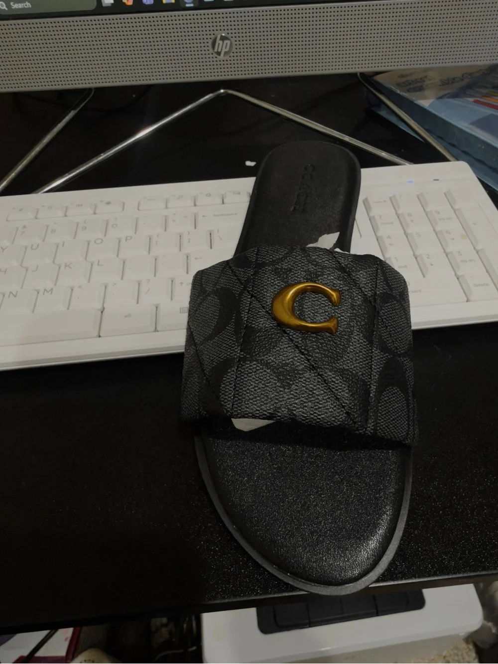 Coach Black Slide sandals with Gold “C”